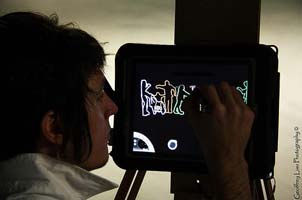 Jerrem Lynch painting on tablet PC