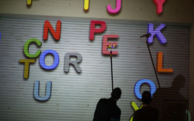 letters game, public art, magnets game, participate, leave messages on building at night, electronic art